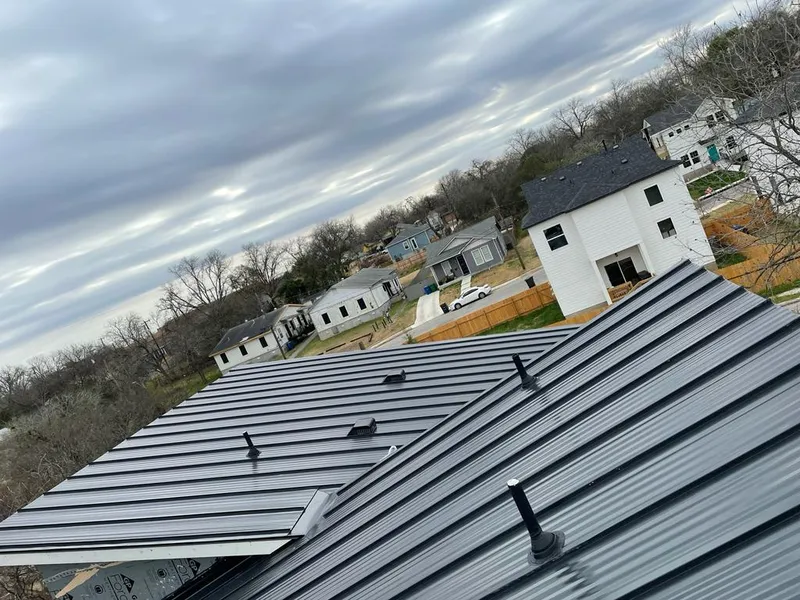 Standing seam metal roof panels with vents for Skylight Repair in Dripping Springs